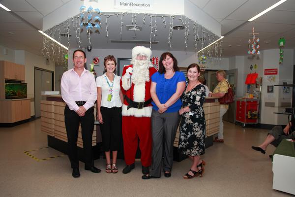 Bayfair centre manager Steve Ellingford, Tauranga Hospital nurse manager Lynnece Dowle, Santa, Bayfair marketing manager Nina Rivett and Tauranga Hospital play specialist Debbie McDougall